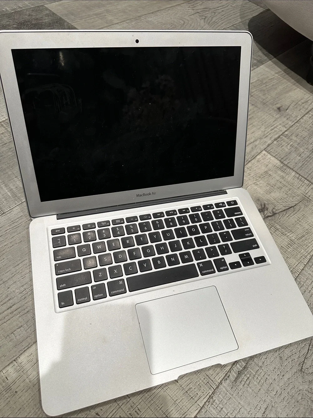 Apple Silver MacBook Laptop with Iconic Logo